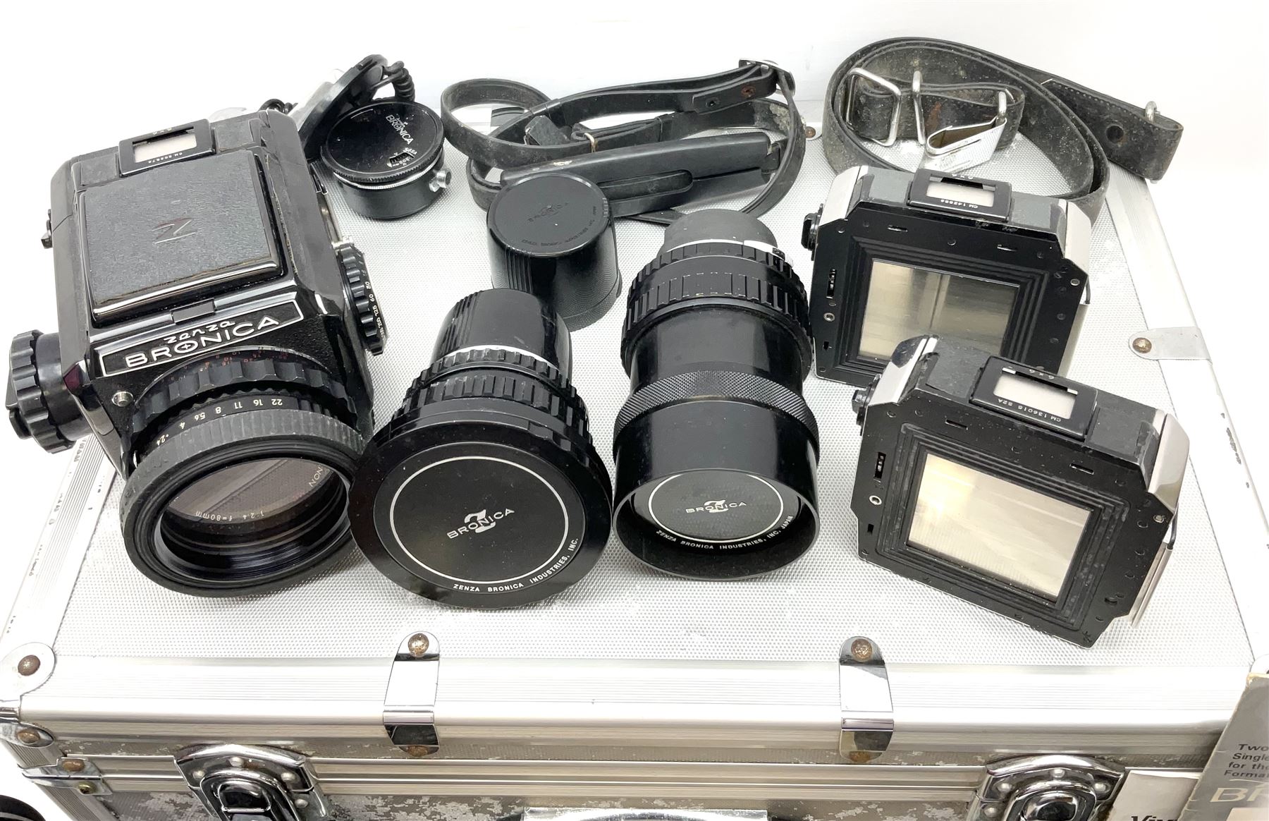 Zenza Bronica S2A medium format camera body, with Zenza Bronica Zenzanon MC '1:2.4 f-80mm' lens, together with Nippon Kogaku Nikkor-P '1:4 f-200mm' lens, Nikkor D.C '1:4 f-40mm' lens, two film backs and other camera equipment, housed in a hard flight case