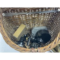 Fishing tackle and accessories housed in two wicker creels, including a landing net, fly tin, small brass reel, other reels to include two Intrepid Boy'o examples, crab lines etc 