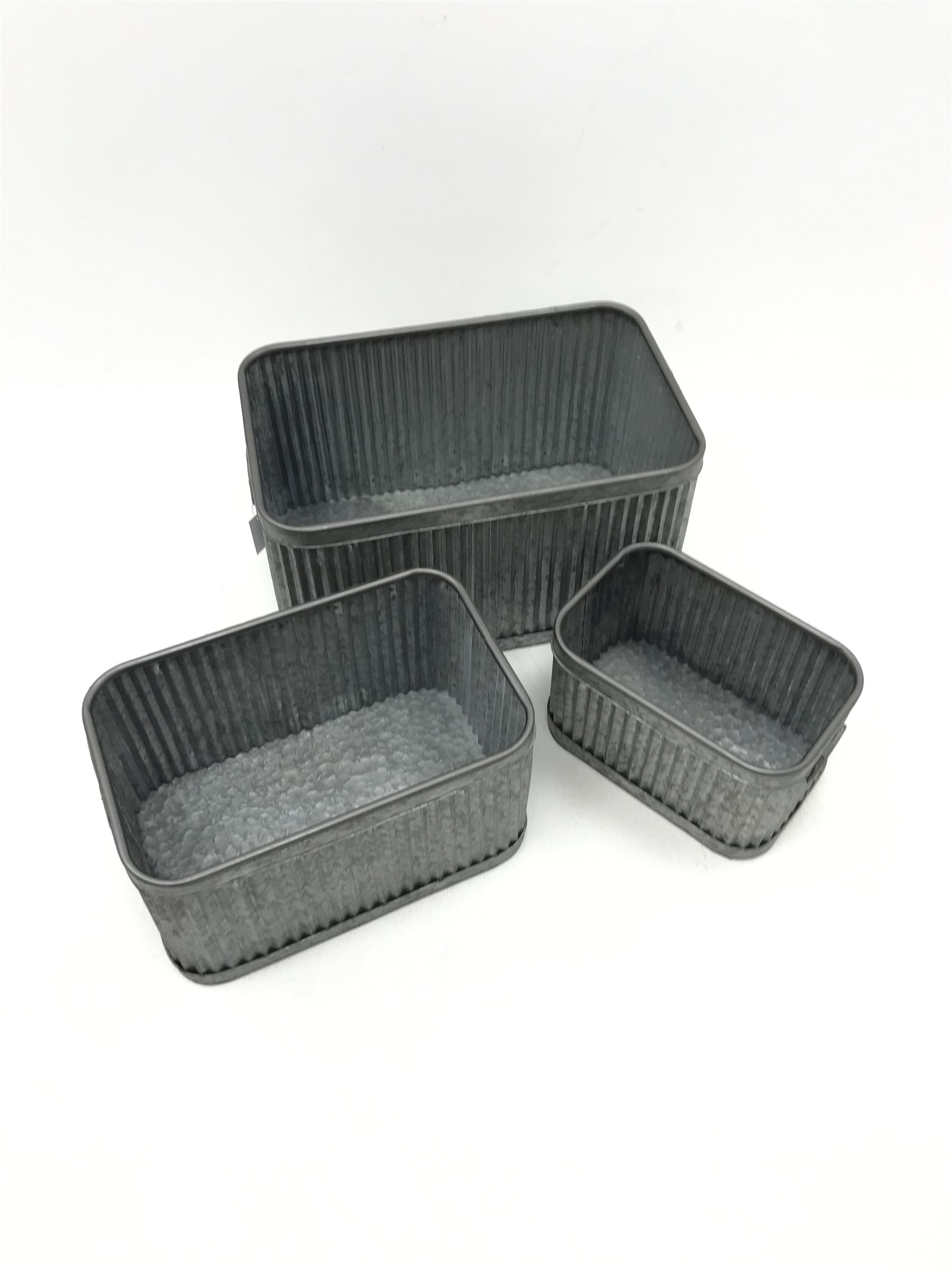 Set of three graduating galvanised tubs (max measurements)