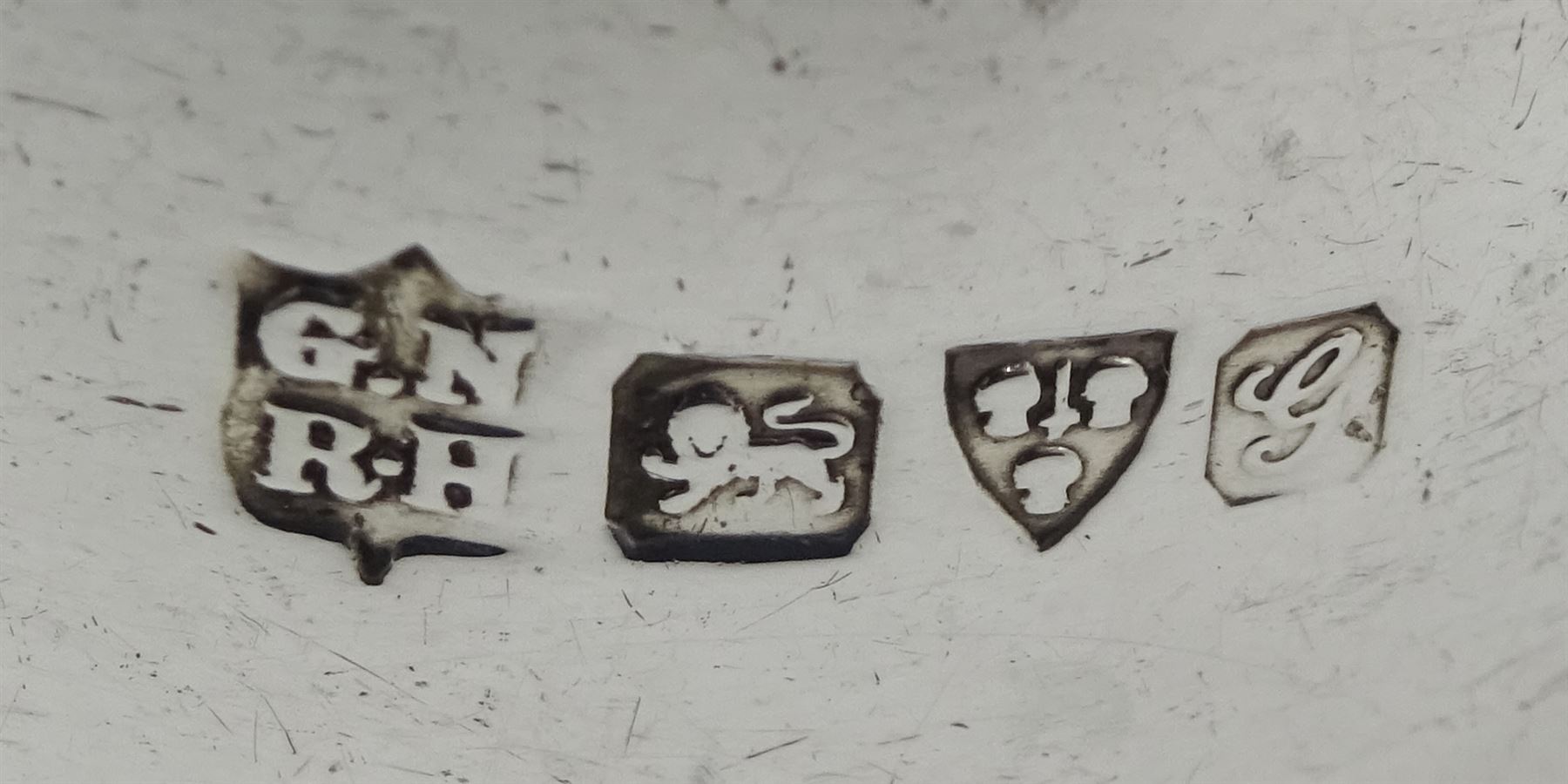 Edwardian silver christening mug by George Nathan & Ridley Hayes, Chester 1909, two silver mustard spoons markers mark P.W, Dublin 1846, six silver napkin rings, silver pierced and engraved picking fork and other flatware, all hallmarked, approx 13.8oz