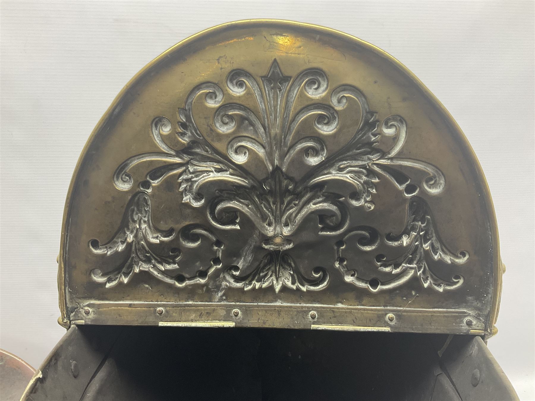 Victorian Benham & Froud Arts and Crafts brass coal scuttle, with Victorian diamond registration mark, together with a copper and brass scuttle of helmet form, tallest H50cm