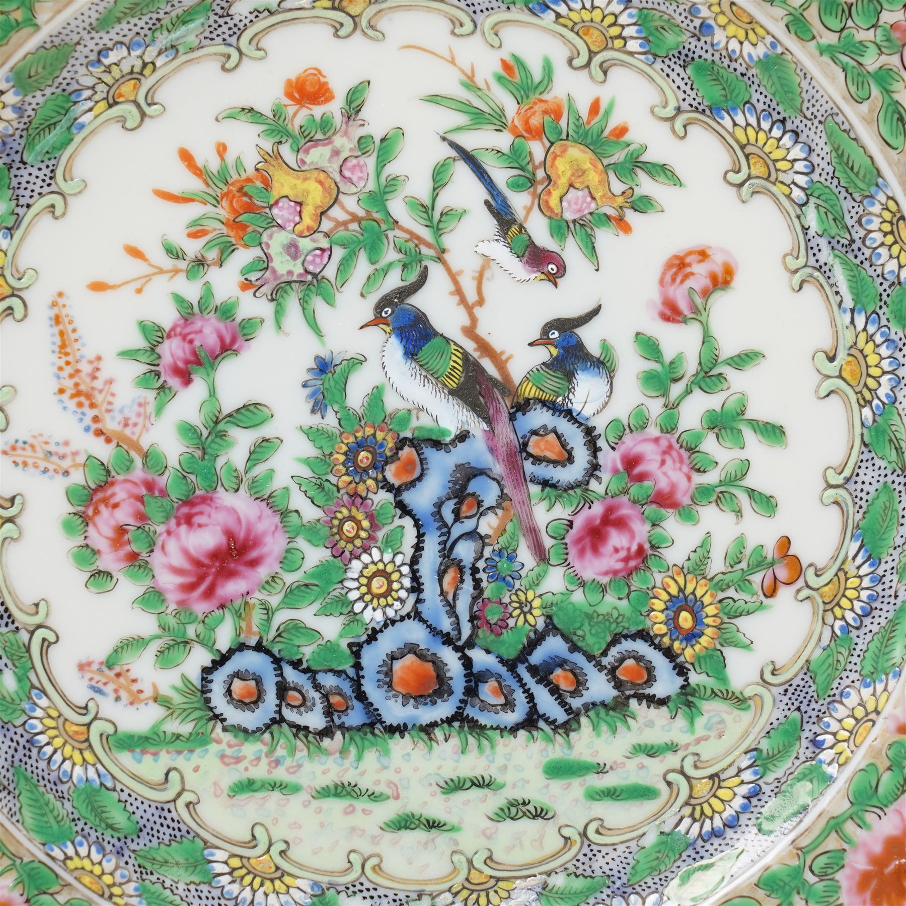 Pair of Canton Famille Rose Medallion plates decorated with exotic birds and plants, with fluted rim, D25cm