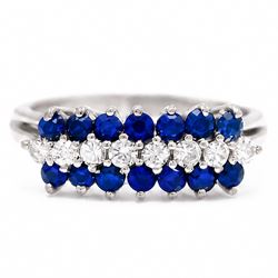 White gold diamond and sapphire three row ring, eight round brilliant cut diamonds, set be...