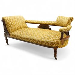 Late Victorian carved walnut-framed and upholstered parlour chaise longue, shaped and padd...