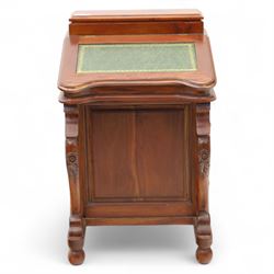 Victorian design mahogany Davenport desk, the sloped writing surface inset with tooled green leather and hinged to reveal a fitted interior, with a pen compartment to the raised gallery back, four drawers to each side, on carved scrolled supports with acanthus detail, raised on turned feet