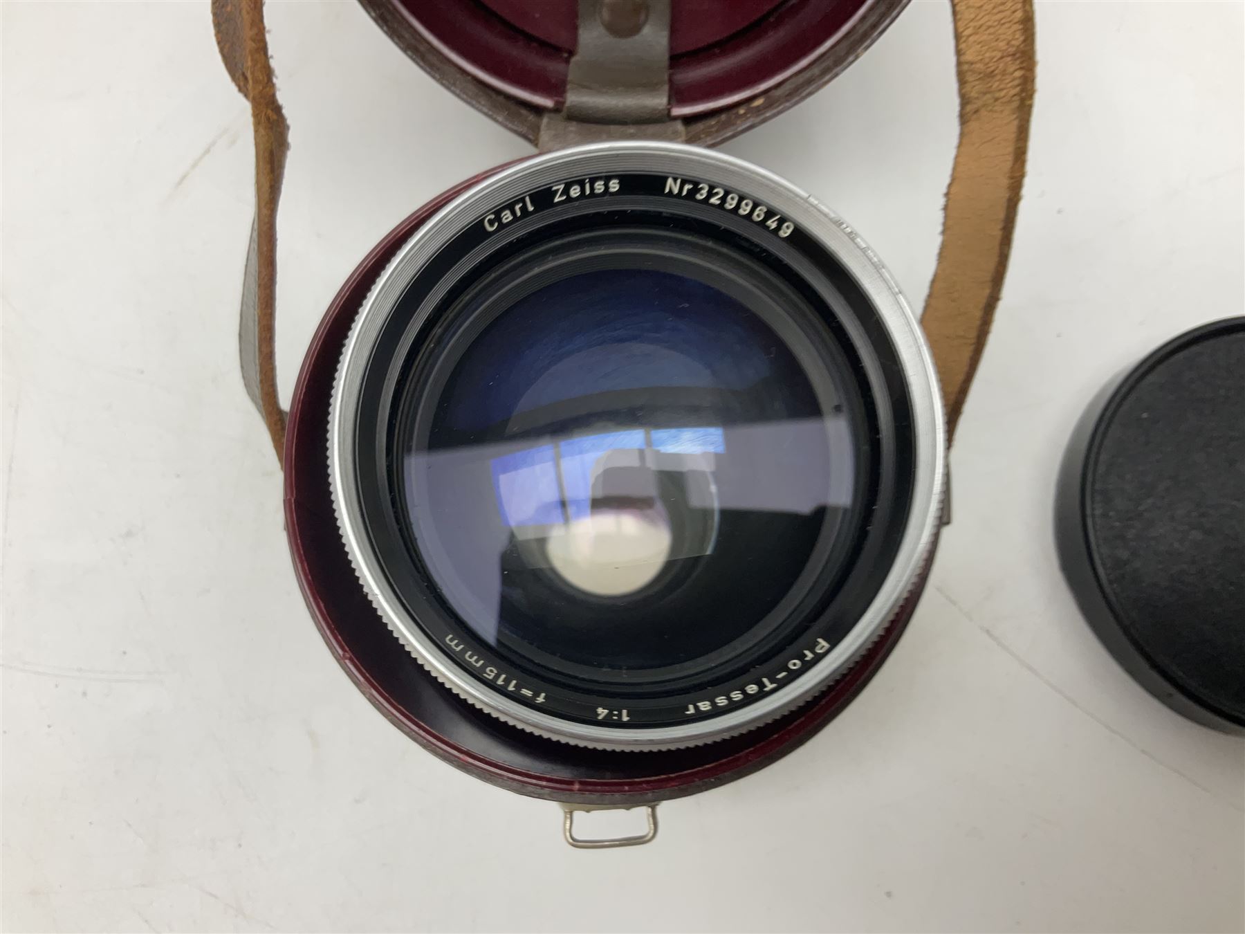 Four Zeiss Ikon camera bodies, to include, Contaflex Super B camera body, serial no. B31591, with 'Carl Zeiss Tessar 2.8/50 lens, serial no.3425553, Contaflex Super BC camera body, serial no. P81728, with 'Carl Zeiss Tessar 2.8/50' lens, serial no 4822280, etc, together with three cased lenses; 'Carl Zeiss Pro-Tessar 1:4 f=115mm' lens, serial no 3734740, 'Carl Zeiss Pr-Tessar 1:3.2 f=85mm' lens, serial no. 3647764 and 'Carl Zeiss Pr-Tessar 1:3.2 f=35mm' lens, and other Zeiss Ikon equipment 