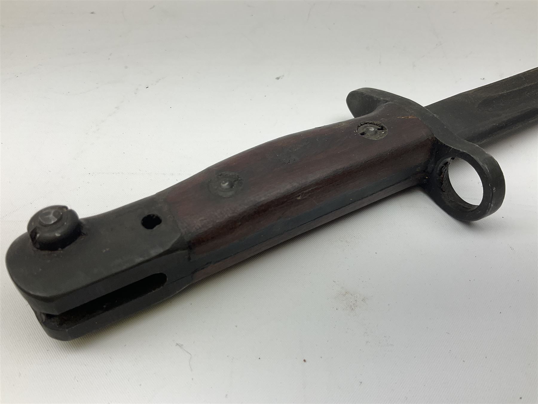Australian Owen sub-machine gun bayonet, the 25.5cm fullered steel blade marked '53'; in metal bound wooden scabbard marled MA53 L41cm overall