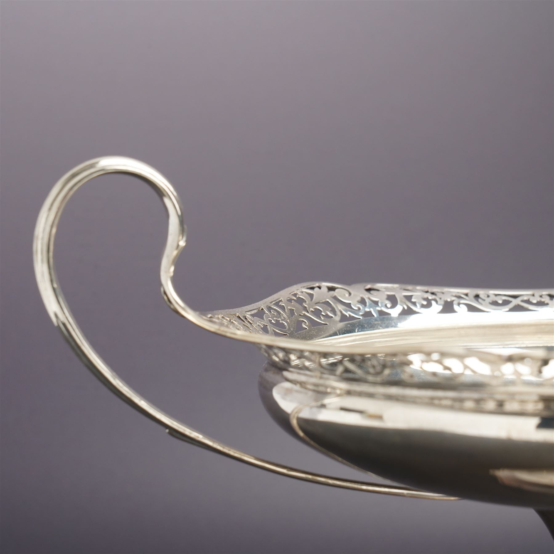 Silver two handled fruit dish with pierced border on a pedestal foot D18cm Birmingham 1912  