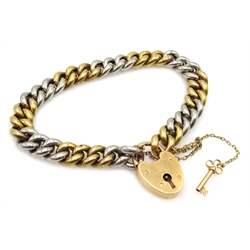  Platinum and 18ct gold (tested) curb chain bracelet with key and padlock, approx 33.7gm  