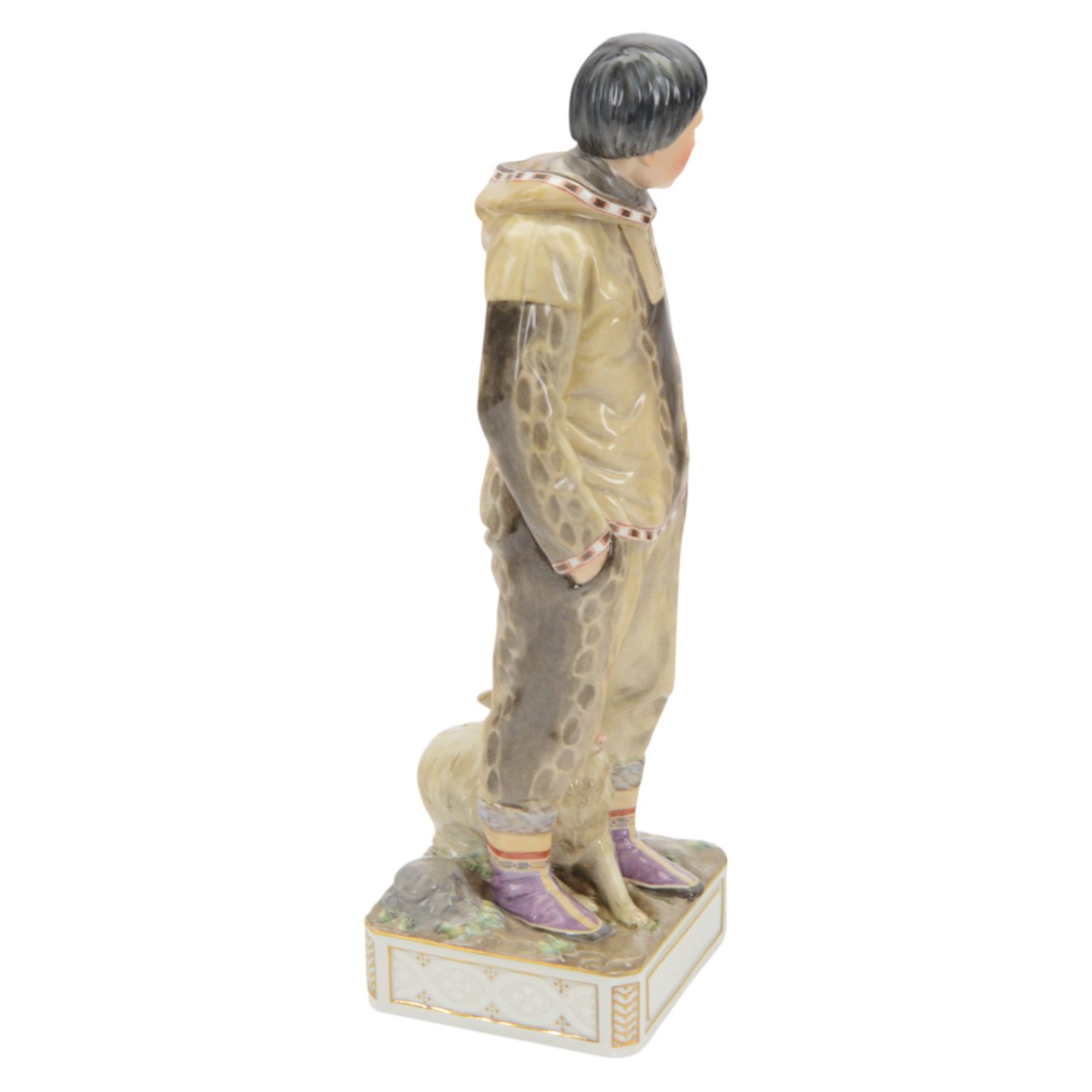 Royal Copenhagen Greenlandic figures, Man with Sledge dog by Carl Martin-Hansen, no.12225, with printed mark beneath, H32cm
