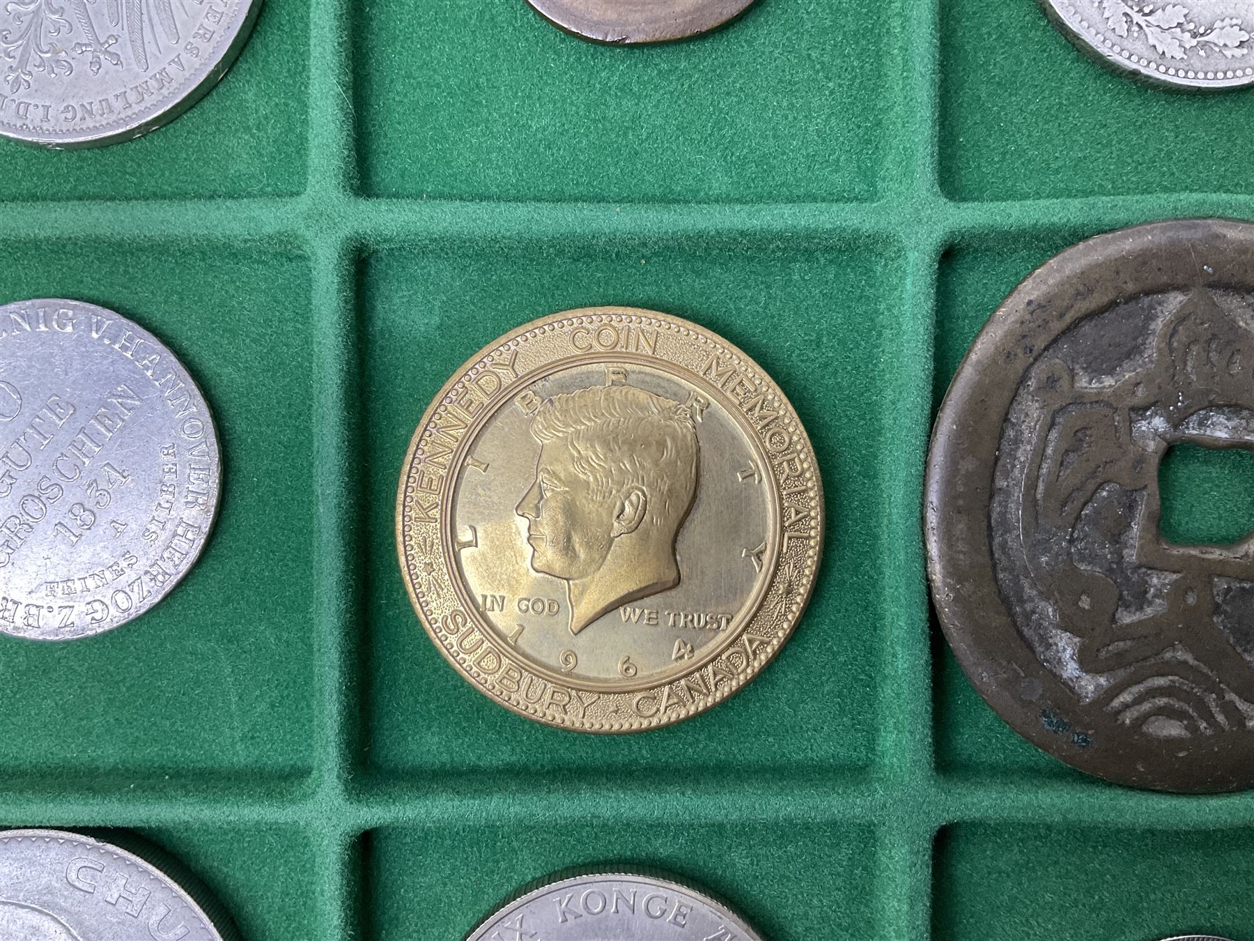 Coins and medallions including, York 1811 one shilling cattle and barber silver token, United States of America 1883O silver Morgan dollar, birds of destiny medal by Malcolm Appleby, Great British King George V 1930 halfcrown, King Edward VII 1902 silver medal, King George V 1916 halfcrown etc, housed in a case with lift out green coin trays