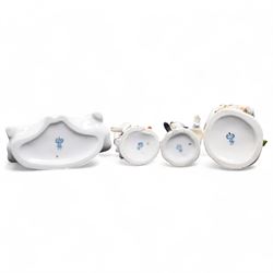 Group of Sitzendorf porcelain figures, one modelled as two children with birds and lambs, the others holding and offering flowers, each upon gilt detailed base, with painted marks beneath (4)