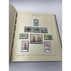 Collection of mostly mint Canadian stamps from 1952 onwards, including some higher values, housed in a 'Schaubek Briefmarken Album Nr944 Kanada' 