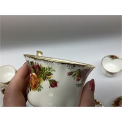 Royal Albert Old Country Roses pattern tea set, comprising teapot, coffee pot, six teacups and six saucers, five side plates, further teacup with joined saucer and side plate, open sucrier, milk jug, cake plate, and preserve pot and cover, together with Royal Albert Jubilee Rose pattern sauce boat and stand, and Royal Albert Lavender Rose pattern cake stand. 