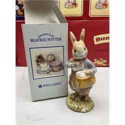 Royal Doulton The Mickey Mouse Collection Pluto figure, Coalport Characters The Snowman Dressing Up figure, three Royal Doulton Bunnykins figures comprising Policeman, Morris Danger and Eskimo, and display stand, Royal Doulton John Beswick Tiggy Winkle, Royal Albert Beatrix Potter Peter Postbag and three Goebel Hummel figures, all boxed