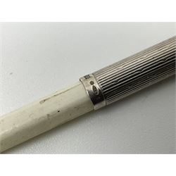 Victorian style silver chatelaine necklace, suspending eight silver sewing and similar accessories, including tape measure, needle case, pencil holder, powder compact and pill box