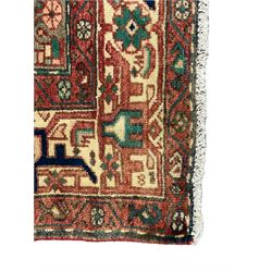 Persian Malayer rug, the field decorated with tree of life, floral, animal and bird motifs, surrounded by three band border with geometric design