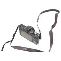 Leica D-Lux 5 digital camera serial no. 4136917, in black finish, with DC Vario-Summicron 1:2.0-3.3/5.1-19.2 ASPH lens, in brown leather Leica case 