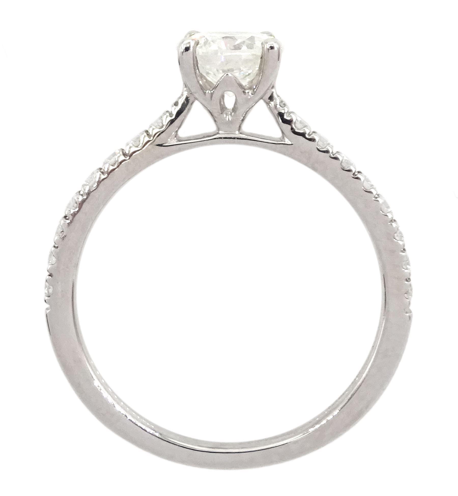18ct white gold single stone round brilliant cut diamond ring, with diamond set shoulders, hallmarked, principal diamond 0.71 carat, with with International Gemological Institute report