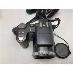 Collection of cameras, including Nikon F401 AF camera body, serial no 2111407, with Sigma Zoom Master 1:3.5-4.5 f=35-70mm lens, Fujifilm camera body etc 