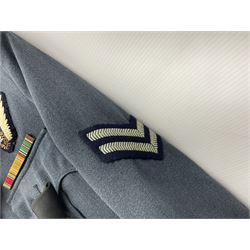 Two post-WWII British Army No.2 Dress tunics, one with Green Howards buttons; army shirt dated 1951; Royal Fleet Auxilliary jacket with trousers; three RAF/WAAF uniforms and RAF Greatcoat; and three canvas/webbing bags, two dated 1943 & 1945