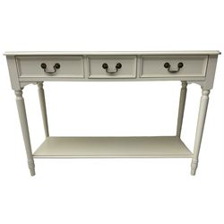 Laura Ashley - 'Clifton' ivory finish three drawer console table, fitted with three frieze drawers with heavily moulded edges, raised on turned supports united by undertier