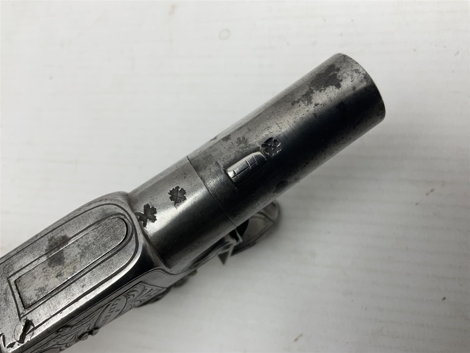 Early 19th century J. Calvert (Leeds) flintlock single barrel tap action pocket pistol, approximately .45 cal., the 4cm (originally) screw off barrel with top safety and walnut stock L16cm overall