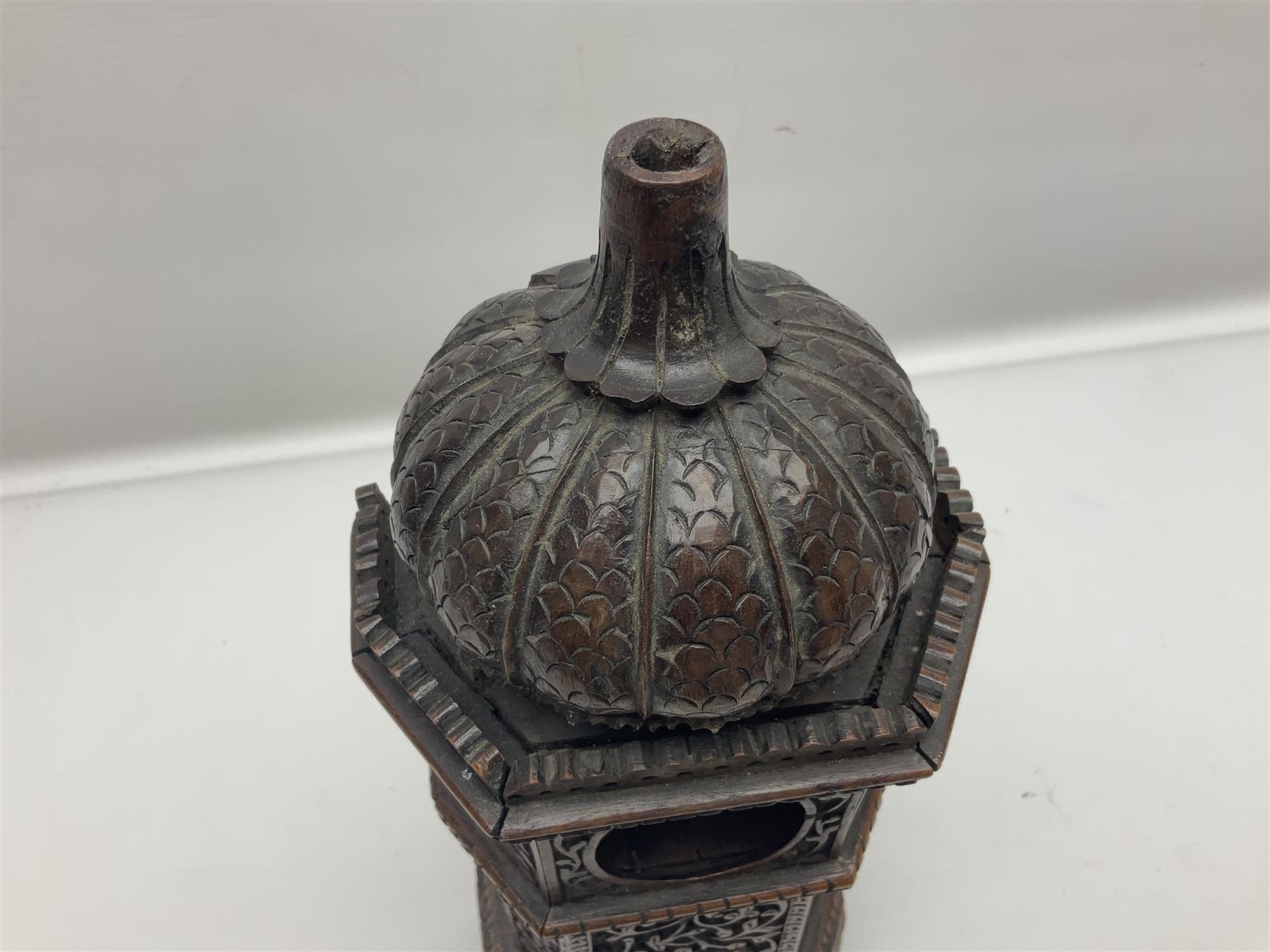 Carved wooden pocket watch holder/stand, in the form of a clock tower, with carved floral design and domed top, H36cm