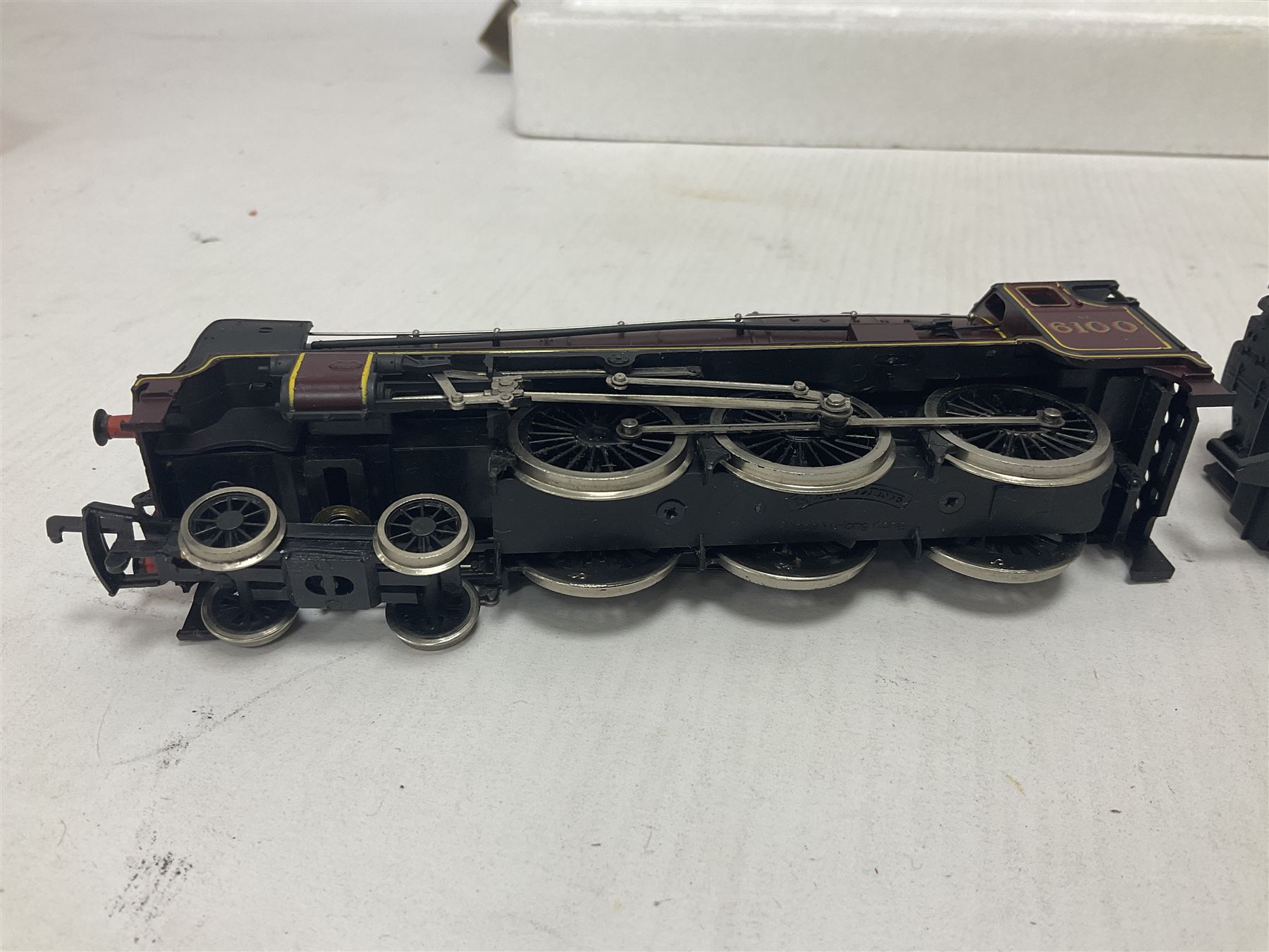 Various makers ‘00’ gauge - four locomotives comprising Mainline Railways ref.37060 Rebuilt Scot Class ‘Royal Scot’ 4-6-0 no.6100 in LMS crimson; Airfix Royal Scot Class ‘Royal Scots Fusiliers’ 4-6-0 no.6103 in LMS black and Class 4F Fowler 0-6-0 no.4454 in LMS black; Lima Class 08 Diesel 0-6-0 Shunting no.7120 in LMS black; all in original boxes (4)