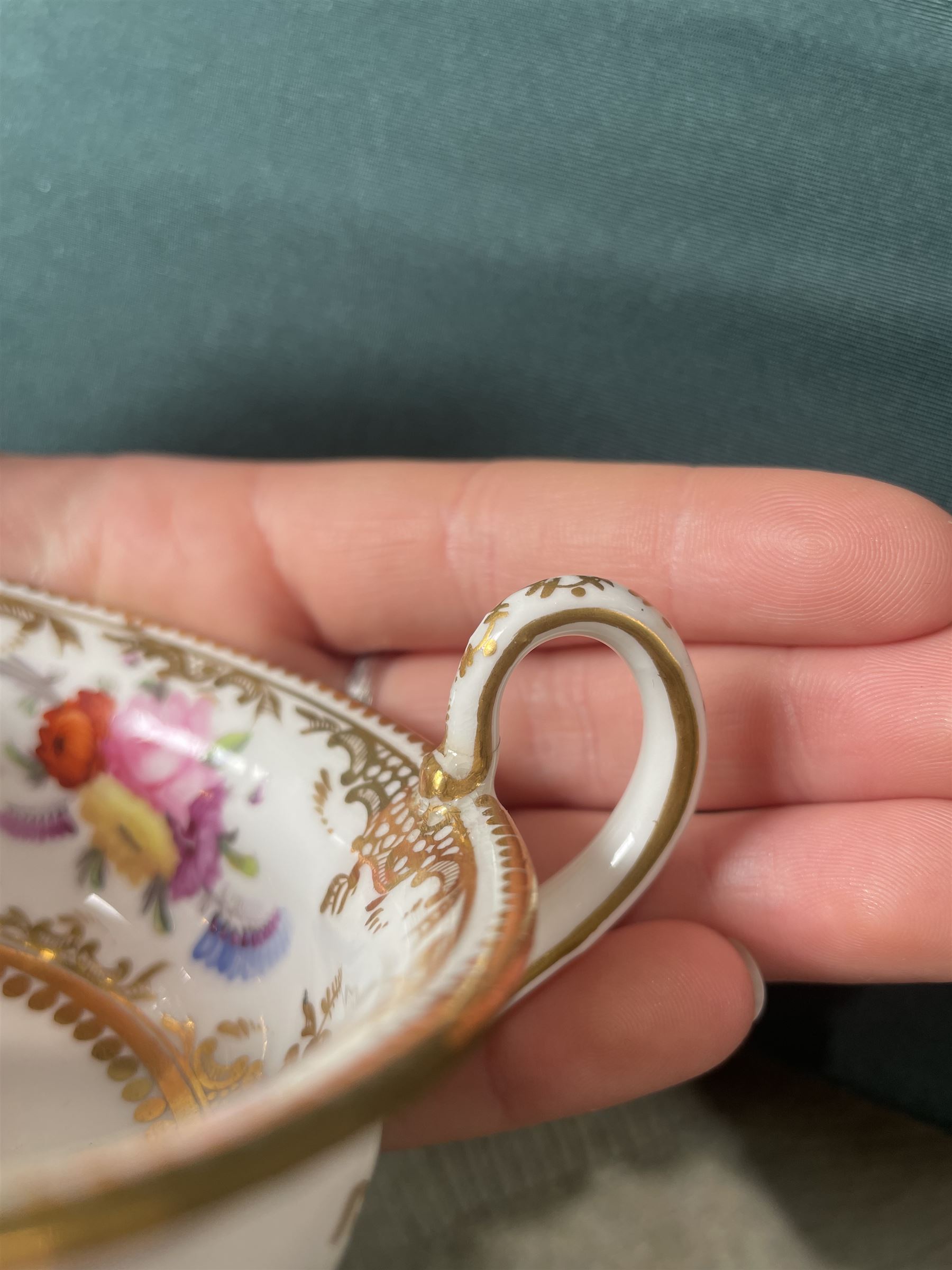 Coalport tea and coffee cups, pattern no. 830, decorated with sprays of flowers within gilt borders, comprising three teacups, four coffee cups and five saucers, with another matched teacup and saucer 