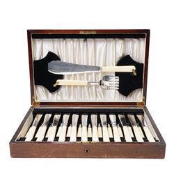 Set of twelve dessert knives and forks with engraved plated blades, silver collars and mother of pearl handles by Walker & Hall in oak box Sheffield 1927 and a set of twelve plated fish knives and forks with servers, boxed