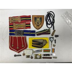 Miscellaneous militaria including two Royal Artillery and one Royal Horse Artillery stable belts; Northamptonshire Regiment trench art brass shell case lighter; unused Matchless Fire-Set; pocket knives and multi-tool; lanyards; oak shield with York & Lancaster crest etc