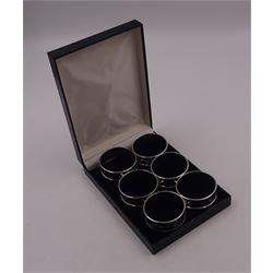 Set of six modern silver napkin rings, with large decorative hallmark to body, hallmarked Mark Houghton Ltd, Sheffield 2003