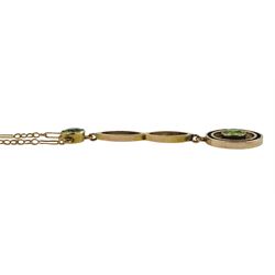 Edwardian 9ct gold two stone round peridot pendant necklace, stamped 9