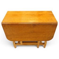 Beaverman - 1980s adzed oak drop-leaf dining table with gate-leg action, adzed top and leaves extending to 129cm, octagonal supports with large Beaver carving, by Colin Almack of Sutton near Thirsk 