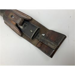 British Enfield 1907 model SMLE bayonet, with 43cm fullered steel blade and metal mounted leather scabbard L58cm overall; and Schmidt-Rubin Model 1918 bayonet the 30cm steel blade marked Elsener Schwyz No.579722; in steel scabbard with leather frog marked G. Bertolini Sellaio Vira/G.Tic 79 L45cm overall (2)