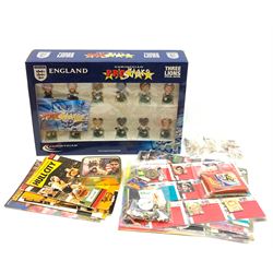 Thirty-two Robertson's Golly badges including Sportsmen, musicians, various professions etc; quantity of pin badges; Corinthian ProStars England 2002 World Cup figures, boxed; Pro Set football cards; small quantity of football programmes including Hull City etc