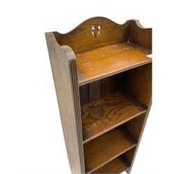 Early 20th century narrow oak bookcase, fitted with four open shelves; and a mahogany two tier lamp table with drawer (2)