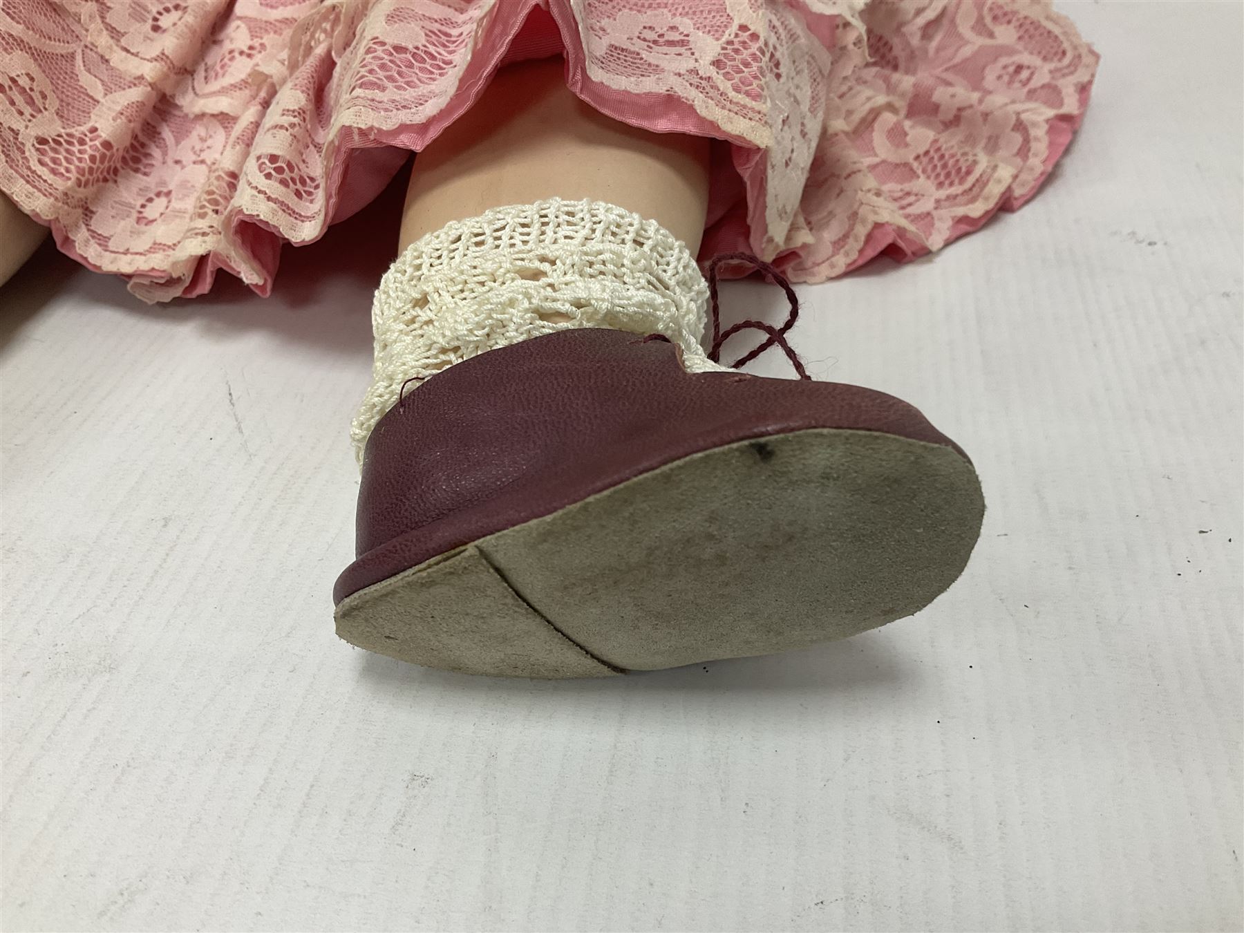 Reproduction Simon & Halbig bisque head doll with applied hair and jointed limbs; marked Simon & Halbig 117, H58cm