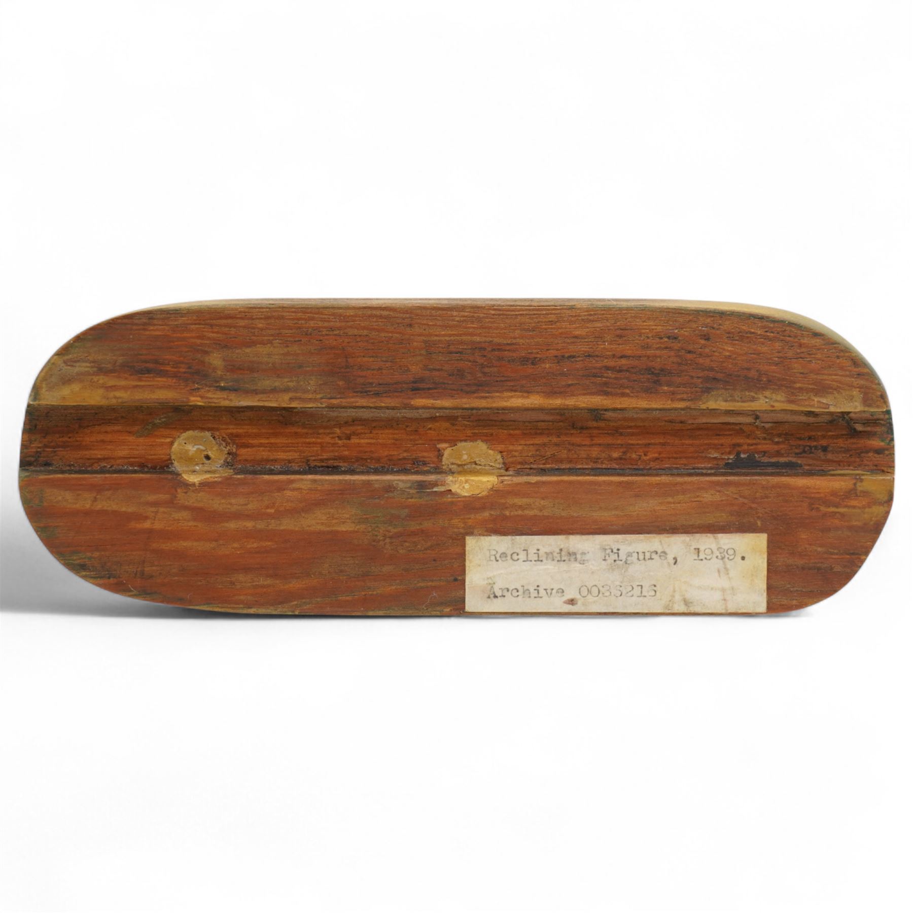 After Henry Moore (British 1898-1986): 'Reclining Figure', terracotta maquette sculpture, base marked with affixed catalogue label inscribed ‘Reclining Figure: 1939 Archive 0074229', W20cm H12cm
Notes: the original is on display at the Tate Britain