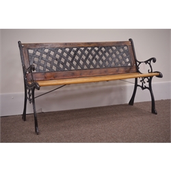  20th century cast iron and wood slatted garden bench with lattice back, W126cm  