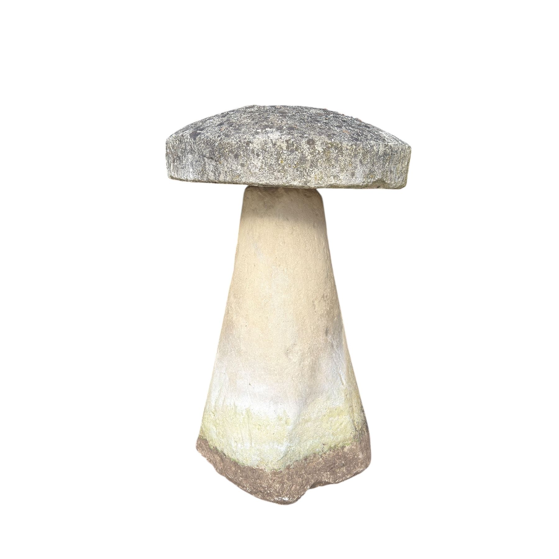 Weathered cast stone staddle stone with circular top raised on tapered base