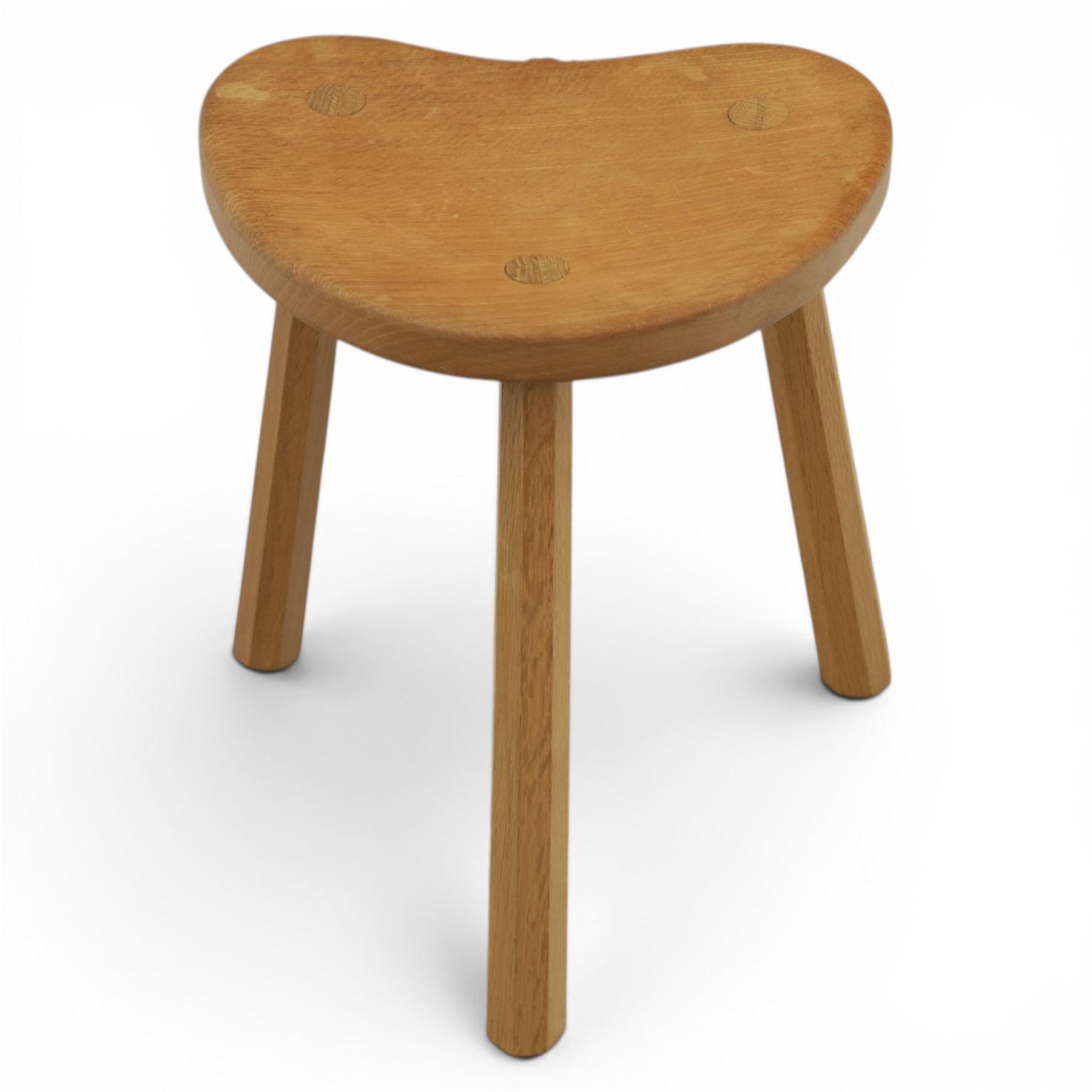 Mouseman - oak three legged cow stool, with carved mouse signature, by the workshop of Robert Thompson of Kilburn