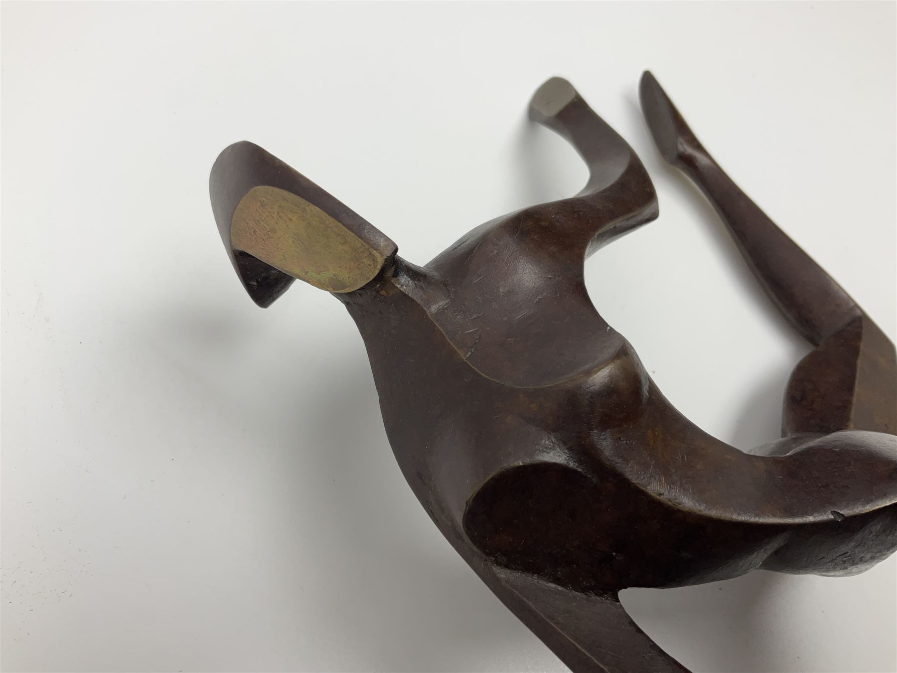 John Huggins FRBS (British 1938): 'Girl with Hoop', bronze sculpture upon black lacquered wooden base, H33cm, artist resale rights apply