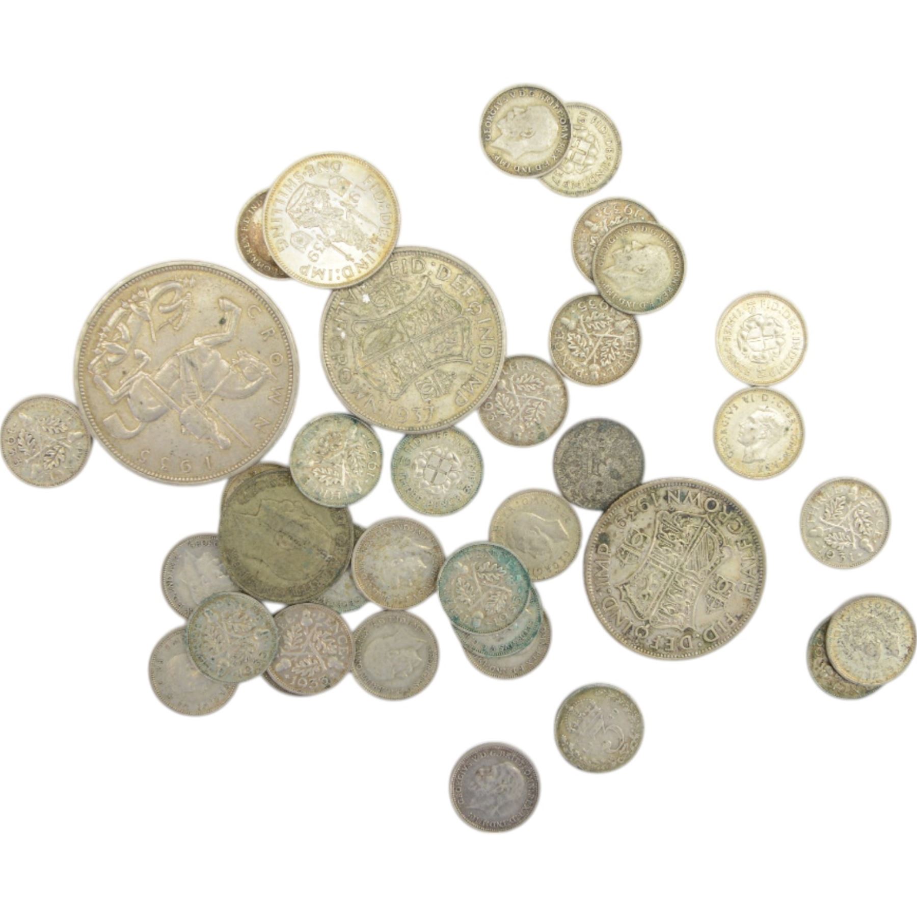 Queen Victoria 1891 silver crown coin, Queen Victoria 1849 'Godless' florin, Queen Victoria 'Gothic' florin (date rubbed), approximately 43 pre-1920 silver threepences, approximately 112 grams of pre-1947 silver coins, Roman Germanicus coin, and further Great British and World coins and banknotes, hosed in a green Ringtons tin