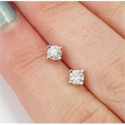 Pair of 18ct white gold round brilliant cut diamond stud earrings, stamped 750, total diamond weight approx 0.40 carat
