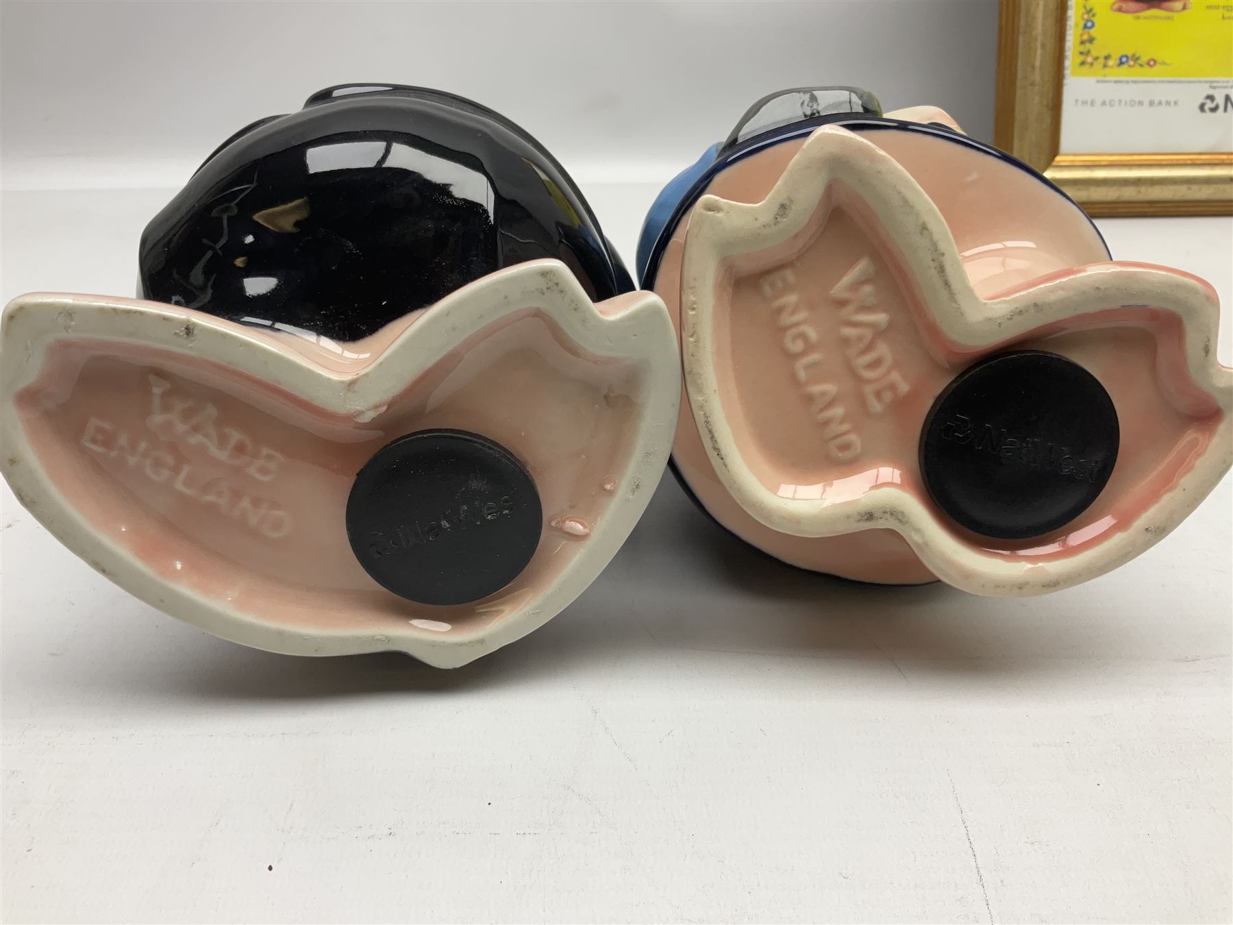  Full Set of Wade Natwest Pigs to include cousin Wesley, with an additional baby and framed leaflet 