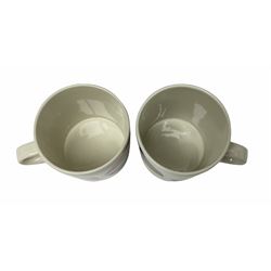 Sir Terry Frost (British 1915-2003): Two earthenware mugs, white glaze with geometric design, one yellow and black colourway, the other red and black colourway H8.3cm (2)