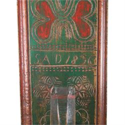 Mid 19th century Norwegian carved mangle board, dated 1836, of rectangular form with carved dala horse handle, with geometic red floral carvings upon a green ground, L63cm