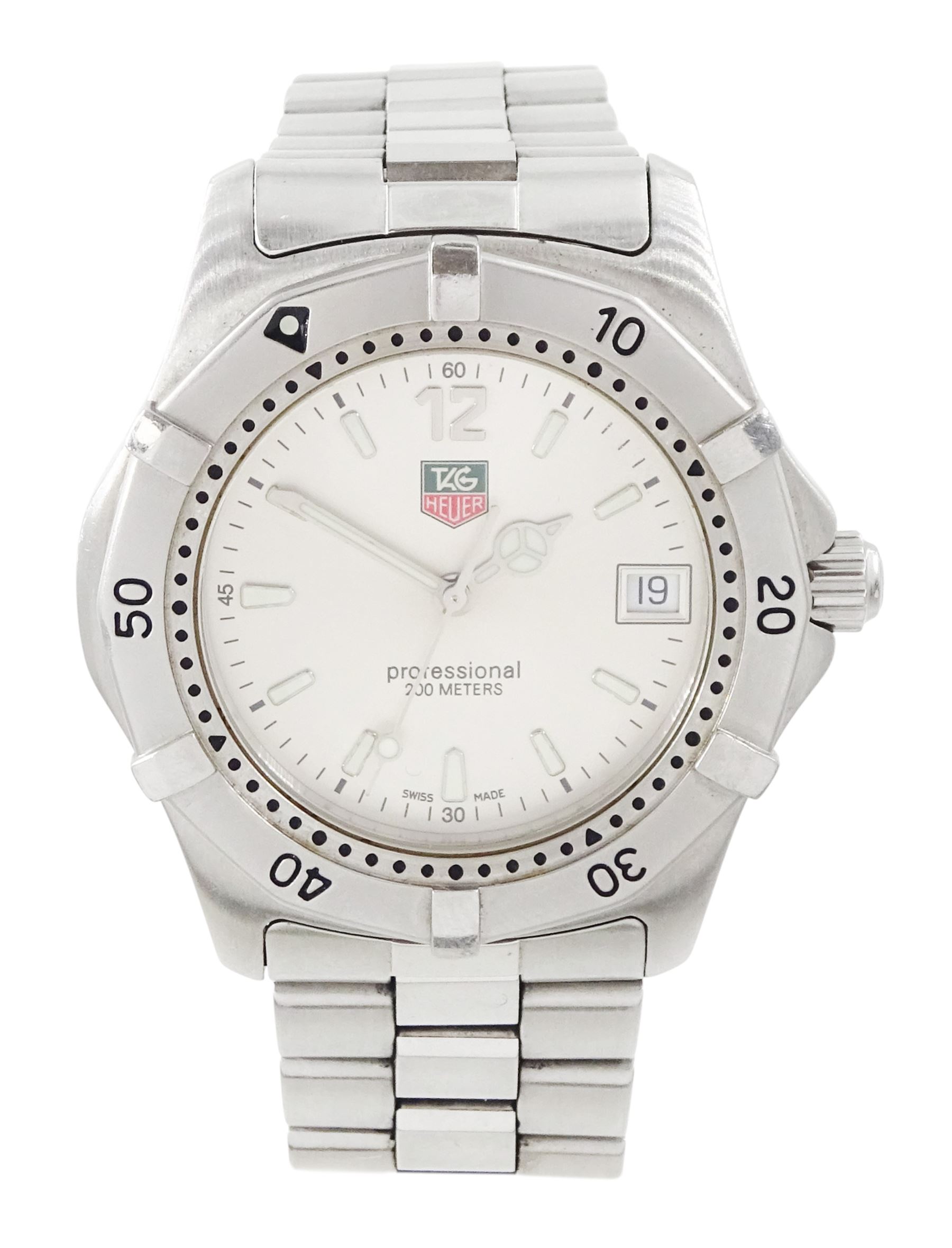 Tag Heuer gentleman's stainless steel quartz wristwatch, Ref. WK1112-0, silvered dial with baton hour markers and date aperture, on original stainless steel bracelet, with fold-over clasp